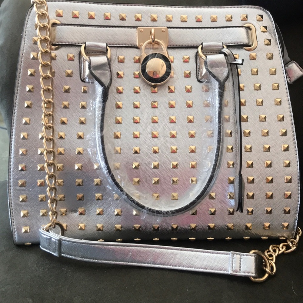 Gold studded handbag